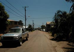The paved road leading into Placencia Village. 